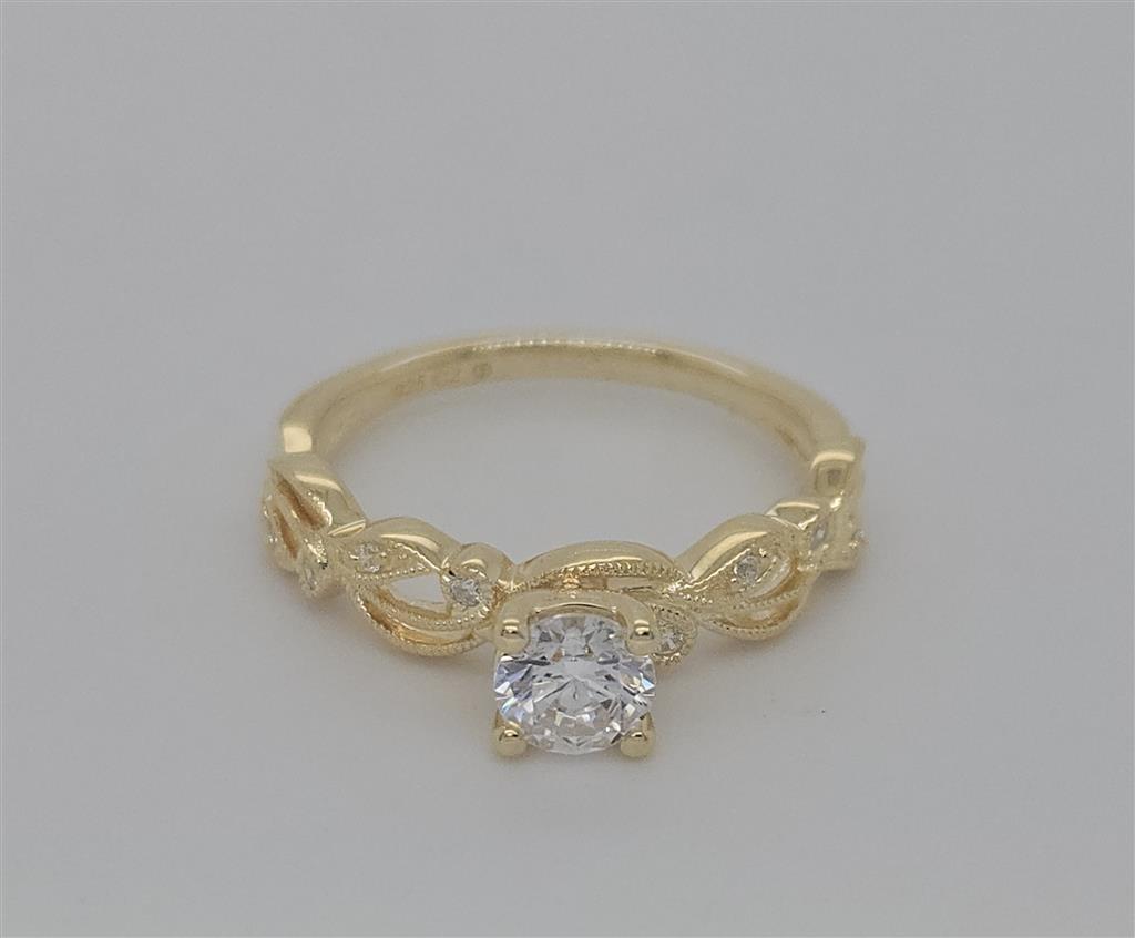 Vintage Bridal: .06 Ctw. Diamond Semi Mount with Millgrain Detail and 1/2 Ctw. Round Center Diamond in 14K Gold