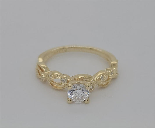 Vintage Bridal: .06 Ctw. Diamond Semi Mount with Millgrain Detail and 1/2 Ctw. Round Center Diamond in 14K Gold